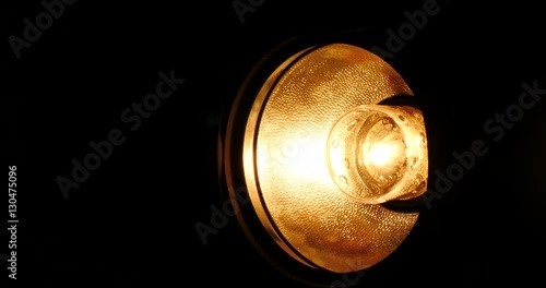 Gradualy brighting studio light.