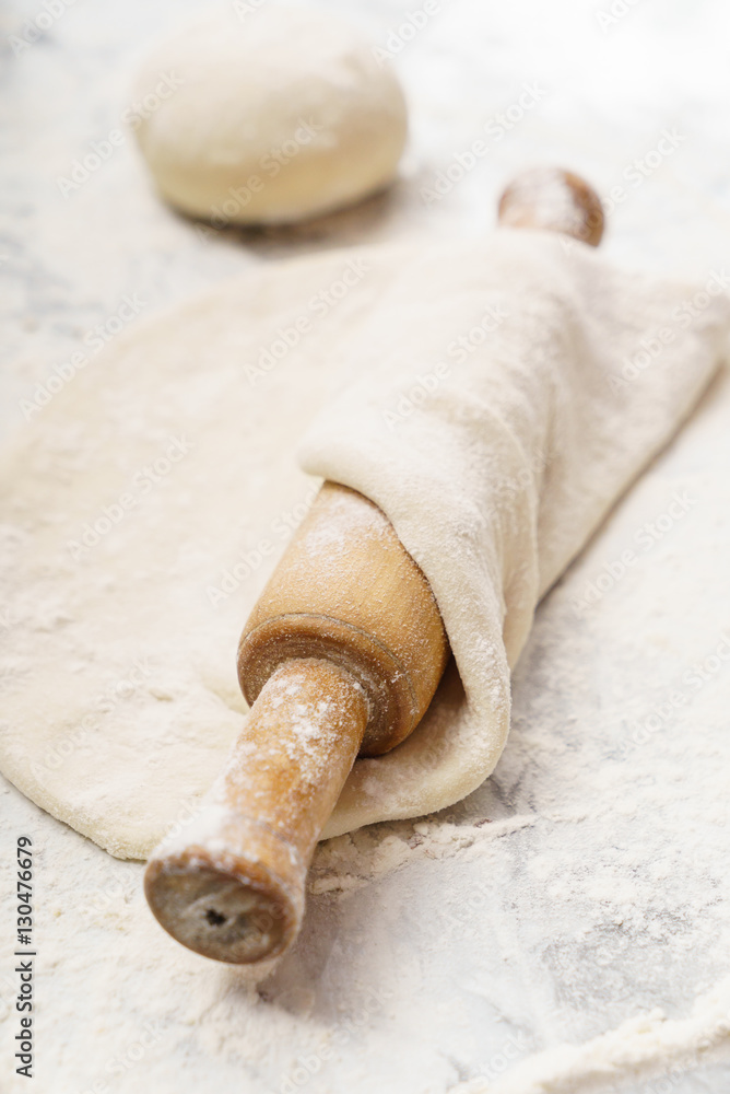 Fresh dough on a board Fresh dough on a board