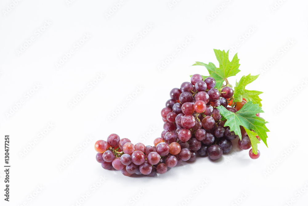 Fresh red grapes isolated on white background...