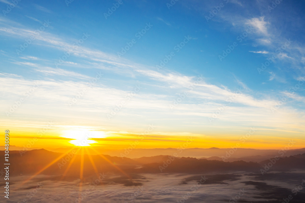 Obraz premium Sunset with sun rays, sky with clouds and sun...