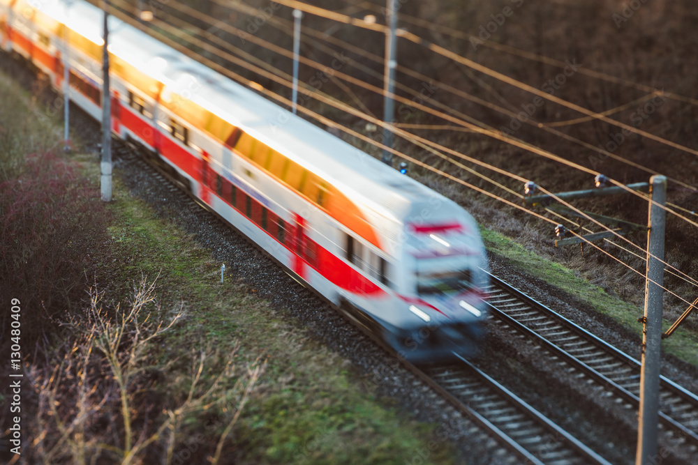 Fototapeta premium Railway in sunset, selective focus 