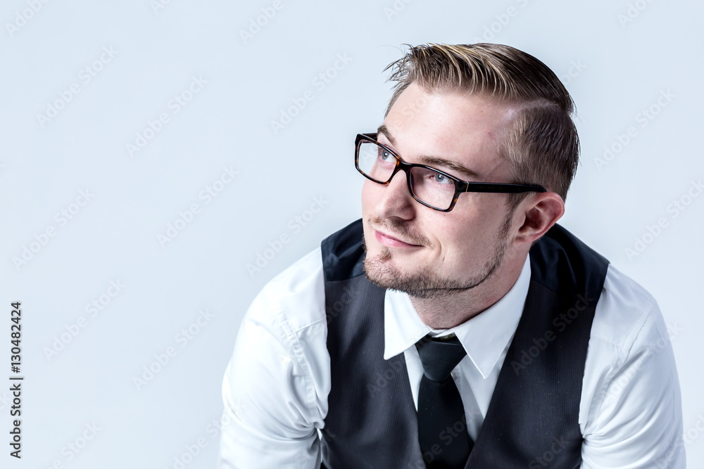 Business man wearing glasses looking to the side Business man wearing glasses looking to the side