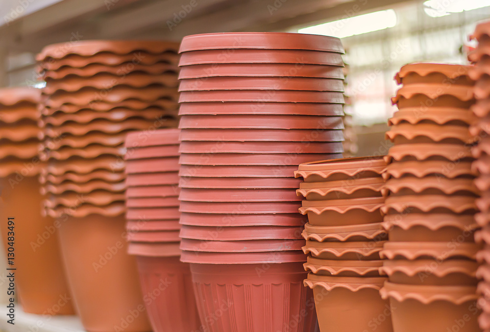 .Plastic pots placed on the floor .Plastic pots placed on the floor