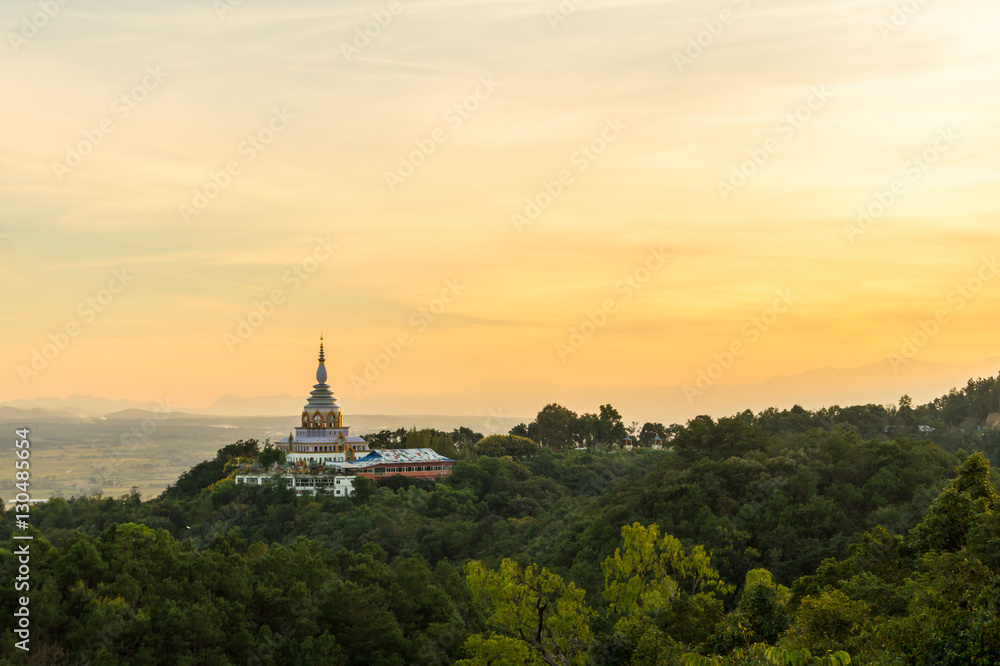 Tha Ton Temple set amid green mountains with sunset sky,Place for religious practices of Thailand