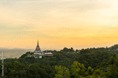 Tha Ton Temple set amid green mountains with sunset sky,Place for religious practices of Thailand