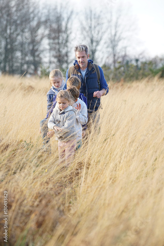 Teacher taking kids to countryside to explore nature