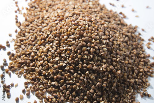 Buckwheat is scattered on the table.