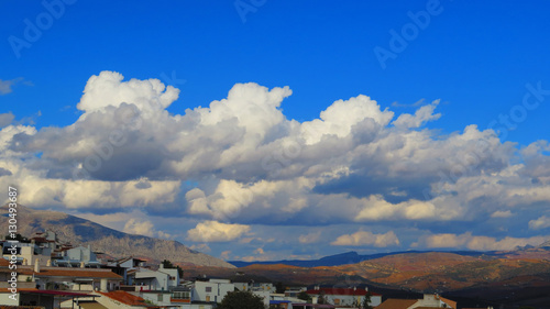 White clouds over village