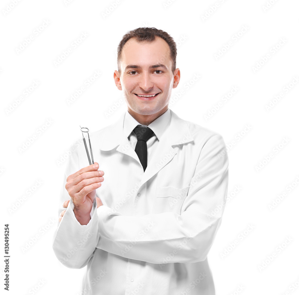 Dentist holding mirror and probe isolated on white Dentist holding mirror and probe isolated on white