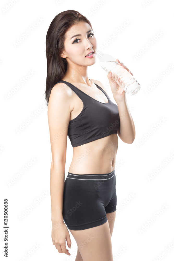 Excited young asian woman showing a bottle of water after doing sport, Isolated over white Excited young asian woman showing a bottle of water after doing sport, Isolated over white