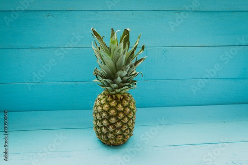 Pineapple on a blue wooden table