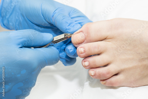 Process of pedicure at beauty salon