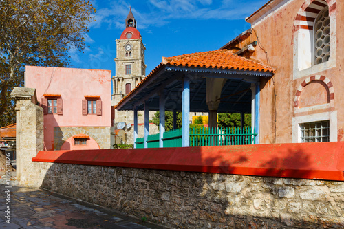 Roloi clock tower and a mosque in the historic town of Rhodes. photo