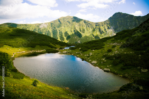 Fototapeta Naklejka Na Ścianę i Meble -  A beautiful mountain lake landscape in Tatry, Slovakia
