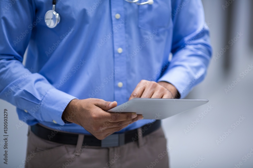 Doctor using digital tablet Doctor using digital tablet