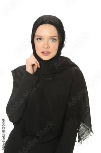 beautiful young muslim women with scarf in studio © murattellioglu