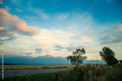 A beautiful mountain landscape with a road