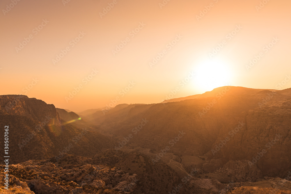 View of the dana Valley, Jordan, at sunset - obrazy, fototapety, plakaty 