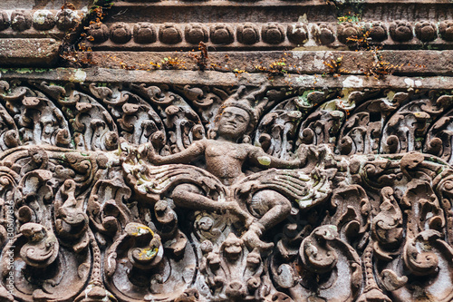 The sculptures on the facade of old buddhist temple of to Wat Phu (Vat Phou) ,the UNESCO world heritage site in Champasak, Southern Laos.