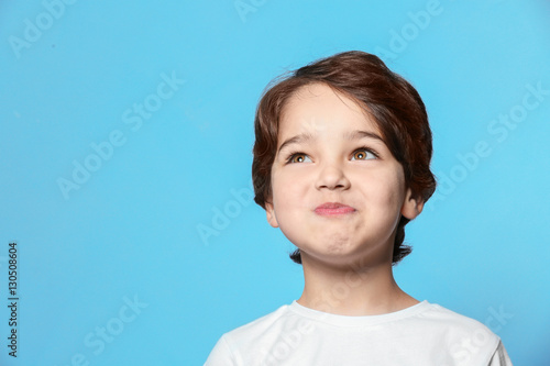 Cute emotional little boy o...