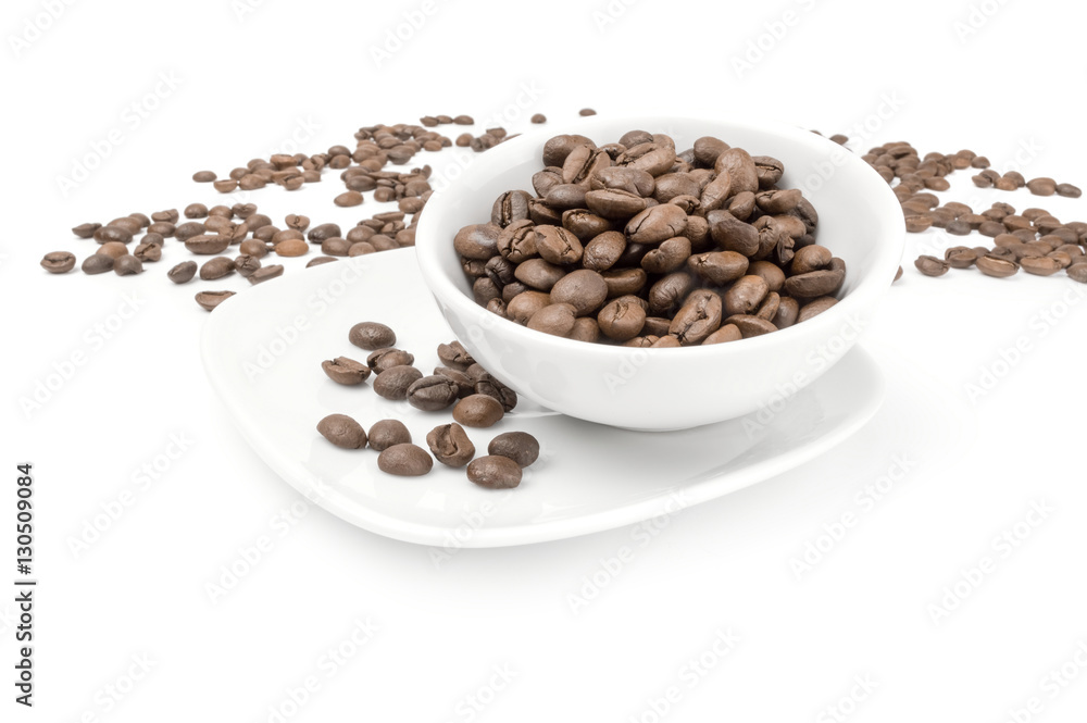 Pile of roasted coffee beans isolated on a white background cutout Pile of roasted coffee beans isolated on a white background cutout