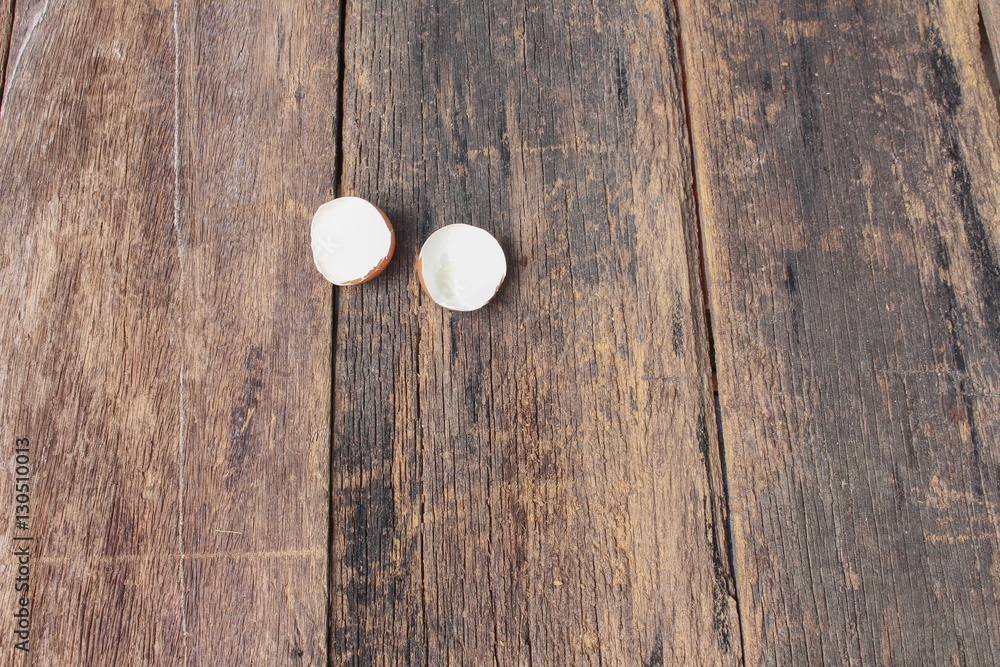 Shell of the egg on wooden table background Shell of the egg on wooden table background