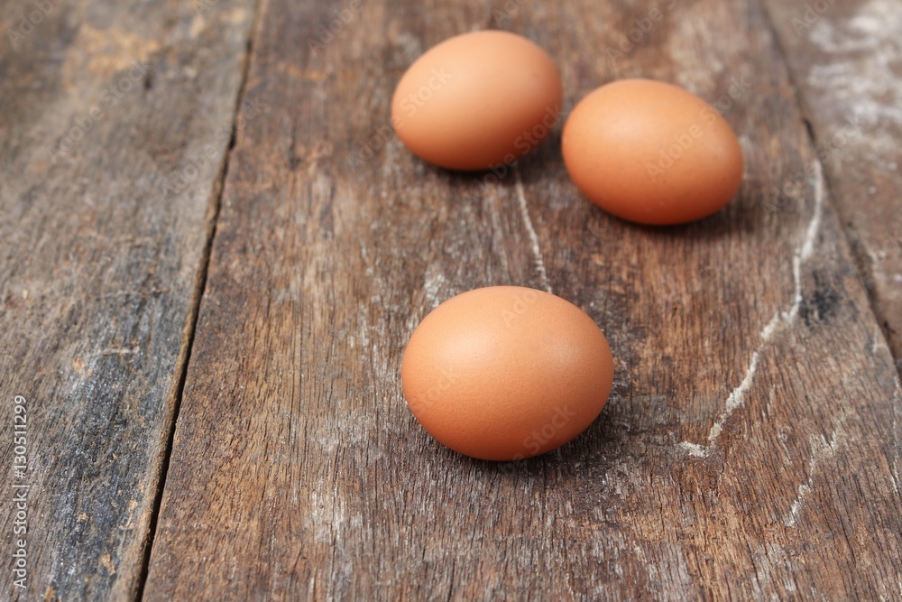 egg select focus with shallow depth of field on wood background egg select focus with shallow depth of field on wood background