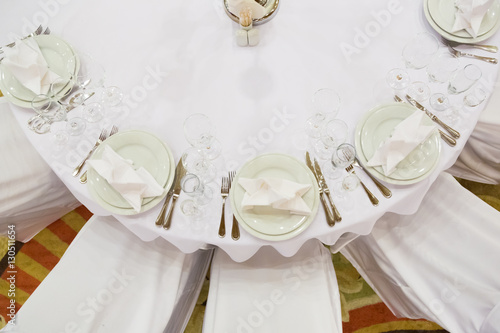 catering table set service with silverware  napkin and glass at restaurant before party