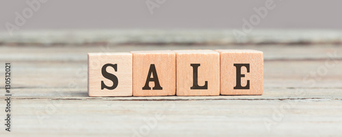 Word Sale written on wood cubes