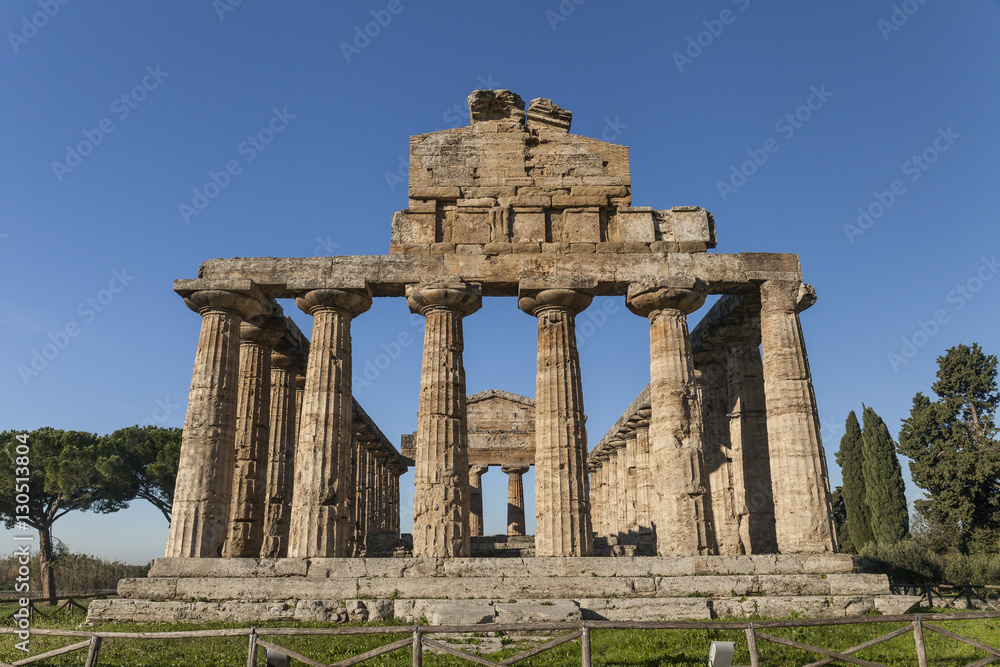 Front view of greek Athena temple, archaeological site of Paestum, Italy