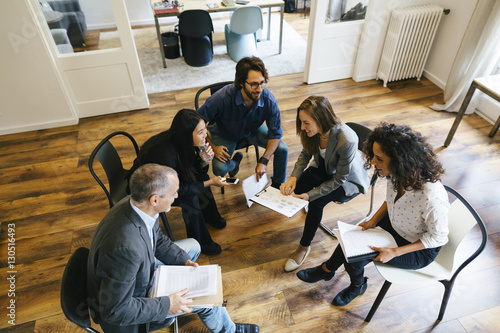 Business people having a team meeting in office