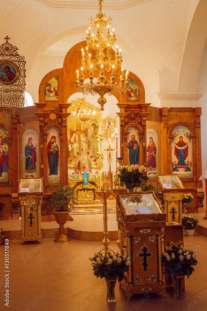 Interior of the Orthodox Church, altar, iconostasis and painted icons