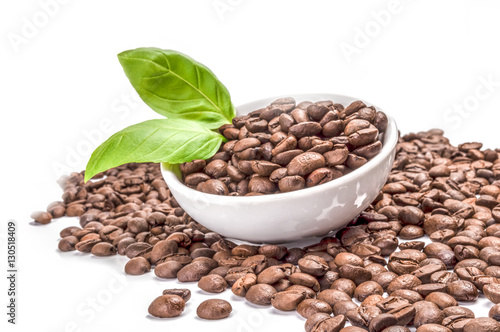 Brown coffee beans on a white background. Clipping path