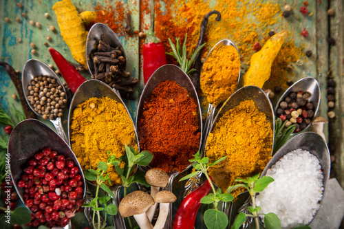 Fototapeta Naklejka Na Ścianę i Meble -  Various colorful spices on wooden table