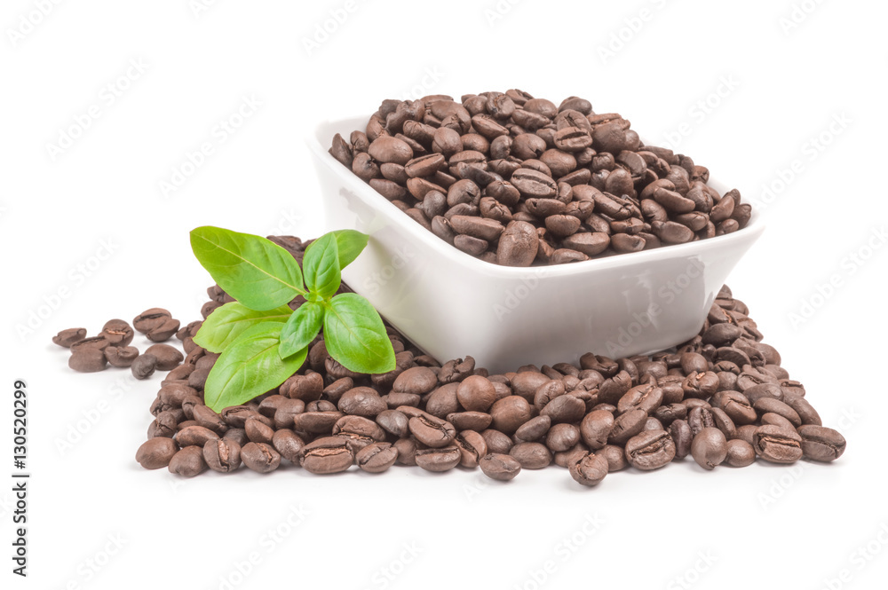 Fototapeta premium Brown coffee beans on a white background. Clipping path