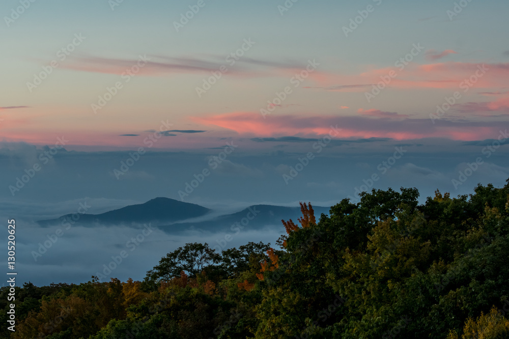 Sunrise over Cloud Covered Valley