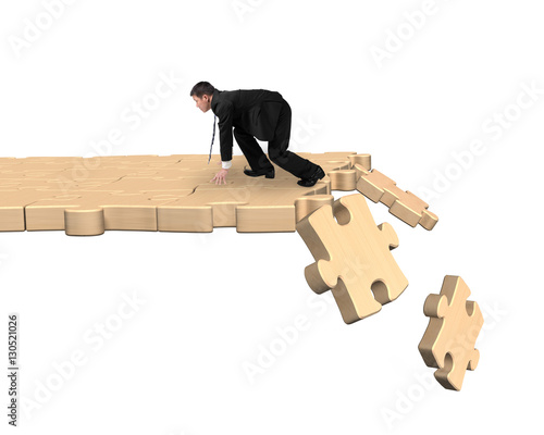 Man ready to run on breaking puzzle path