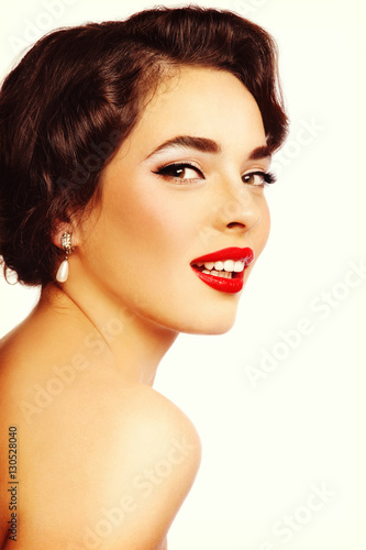 Portrait of young beautiful sexy smiling woman with glamorous make-up and hairstyle, on white background