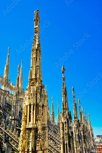 View of the rooftop of the Milan Cathedral in a sunny day in Milan.