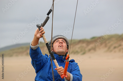 kitesurfer on the beach photo