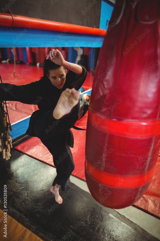 Female karate player practicing boxing 