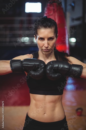 Female boxer performing boxing stance
