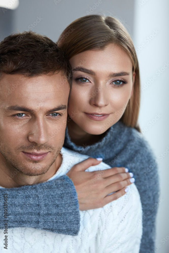 Romantic Couple. Beautiful Woman And Handsome Man In Sweater Romantic Couple. Beautiful Woman And Handsome Man In Sweater