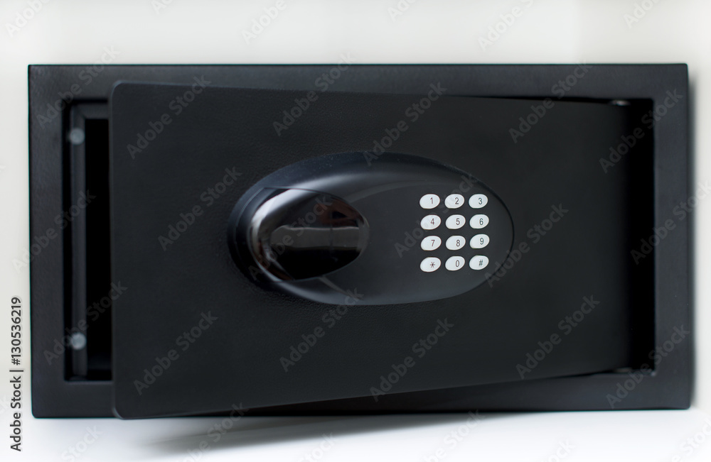 Black small home or hotel safe with keypad. Black small home or hotel safe with keypad.