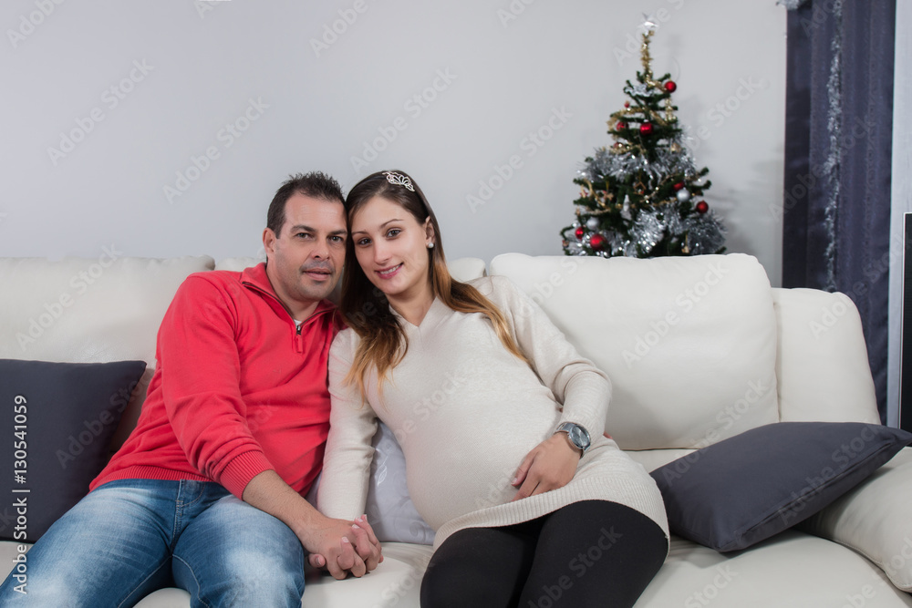 happy pregnant girl and husband