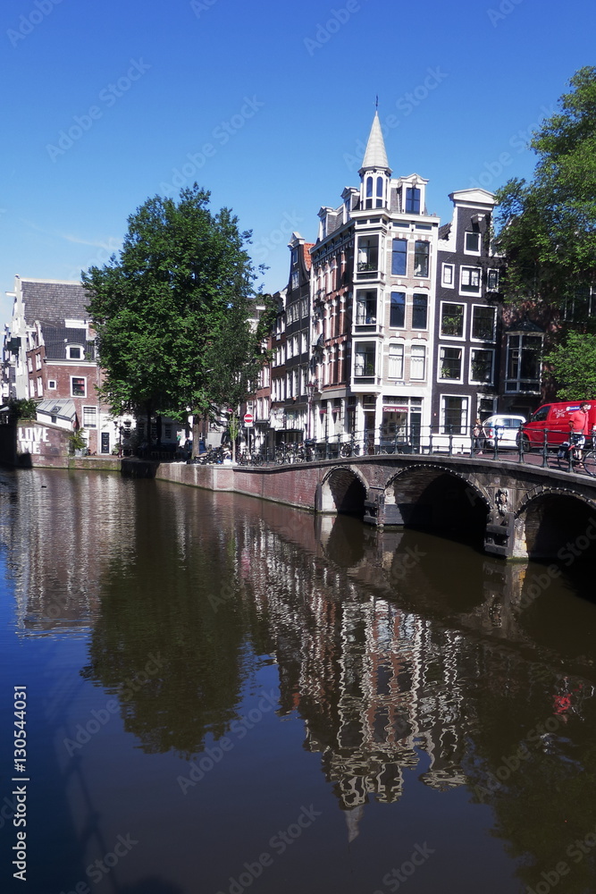 Obraz premium Traditional houses on the canal - Amsterdam - Netherlands