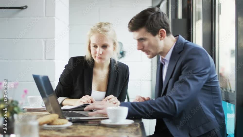 Business People are Looking at a Screen and Make a Deal Business People are Looking at a Screen and Make a Deal