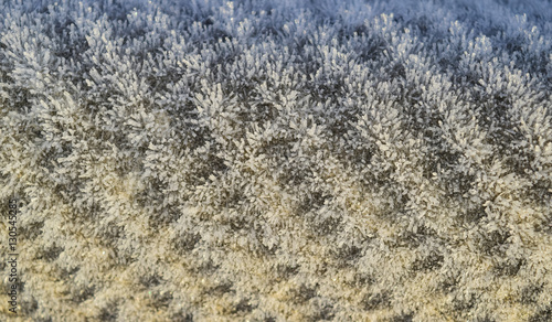 Background of a sheet of slate covered with frost