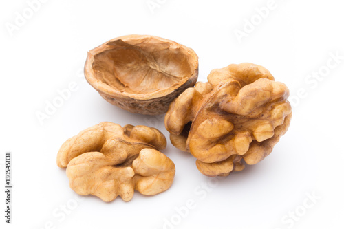 Quadro em tela Walnut and walnut kernel isolated on the white background.