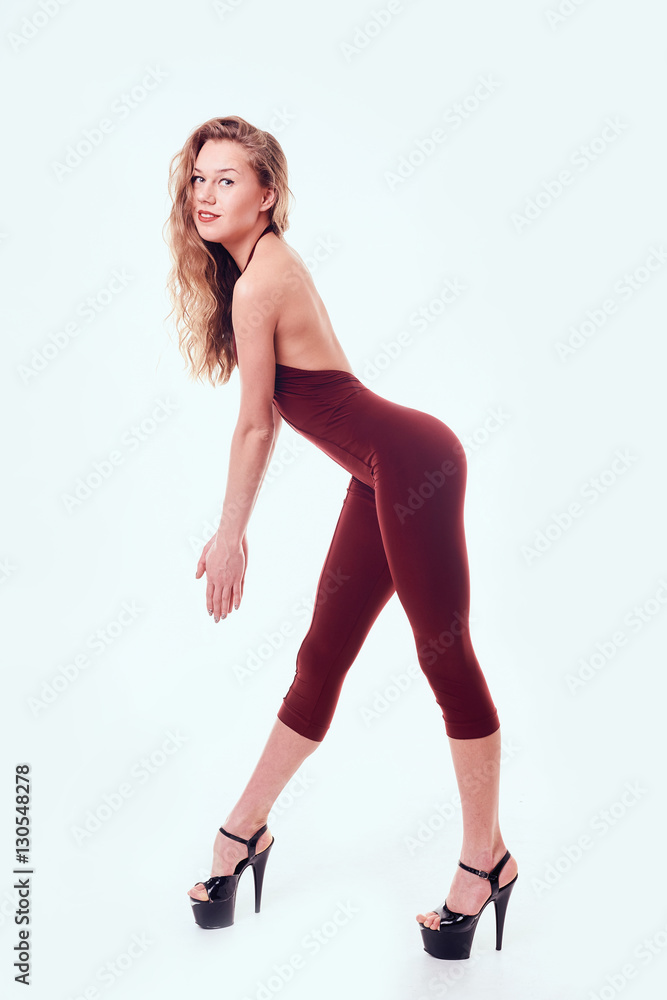 modern style dancer posing on studio background